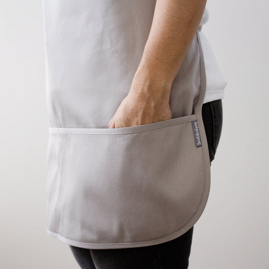 Load image into Gallery viewer, Greenery Wreath Apron | Personalized Grey Kitchen Apron | Custom Apron | Kitchen Apron | Custom Monogram Apron | Cotton Canvas Full Apron
