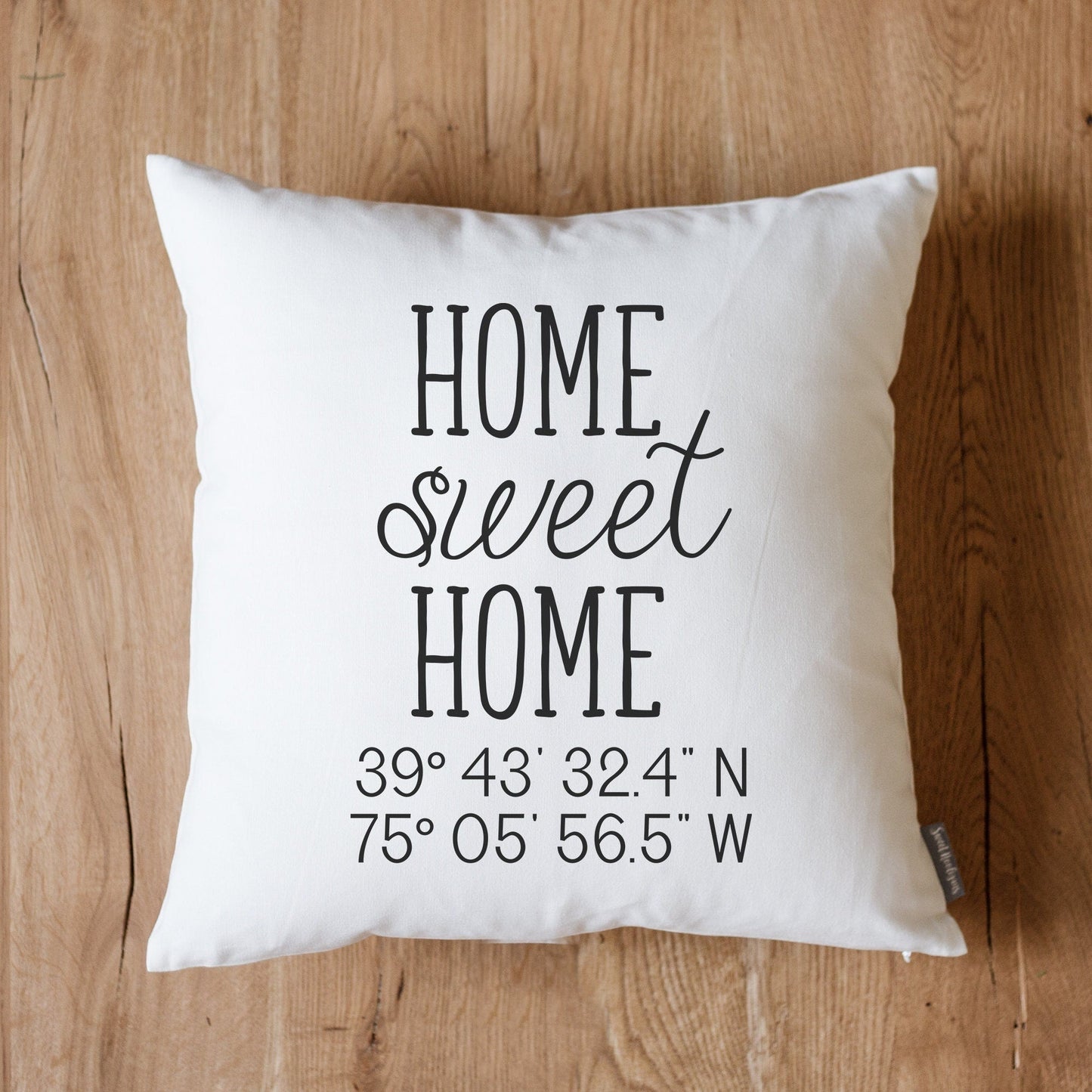 https://sweethooligans.design/cdn/shop/products/home-sweet-home-coordinates-new-home-housewarming-gift-for-new-couple-gift-latitude-longitude-pillow-gps-coordinates-lat-long-pillow-337942_1445x.jpg?v=1668883755